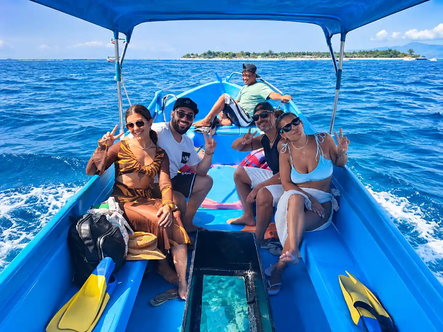 Snorkeler exploring clear water around the Gili Islands