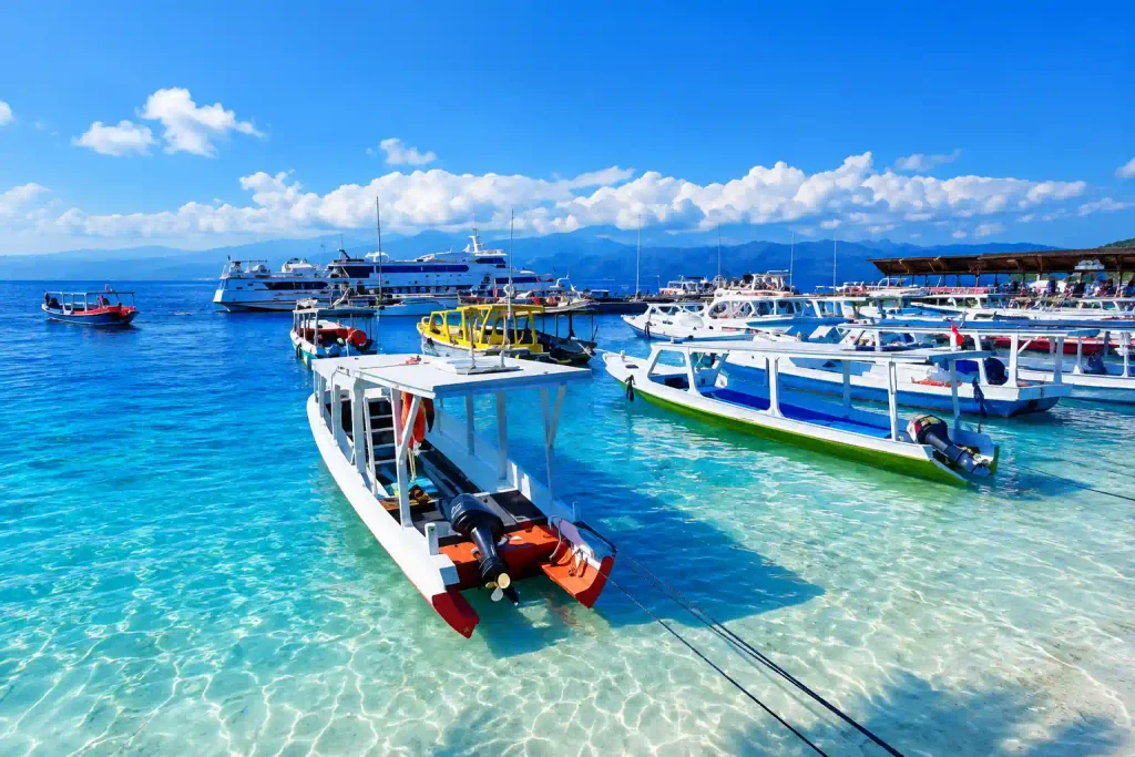 Clear shallow water around a snorkeling boat